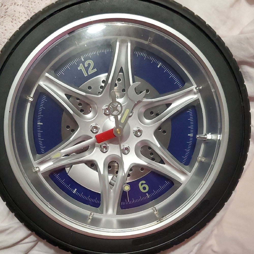 Tire Clock With Screwdriver And Wrench Clock Hands. Lights Up Or Can Leave Light